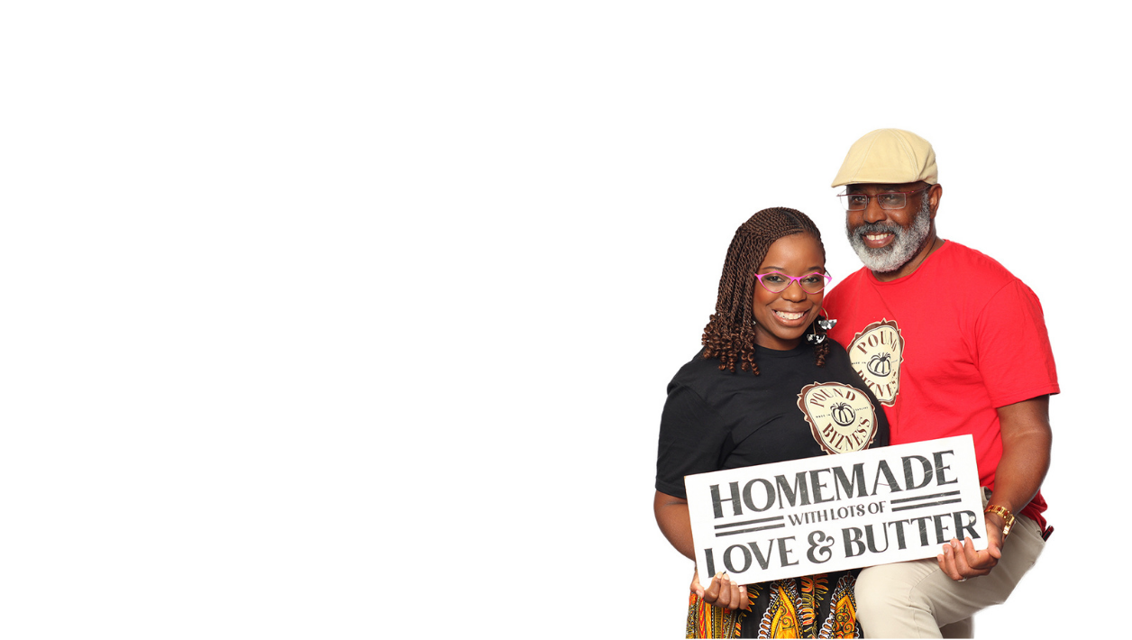 Reggie and Nicole Borders, owners of Pound Bizness, smiling next to the slogan Best Bundts Rooted in Love and Butter.